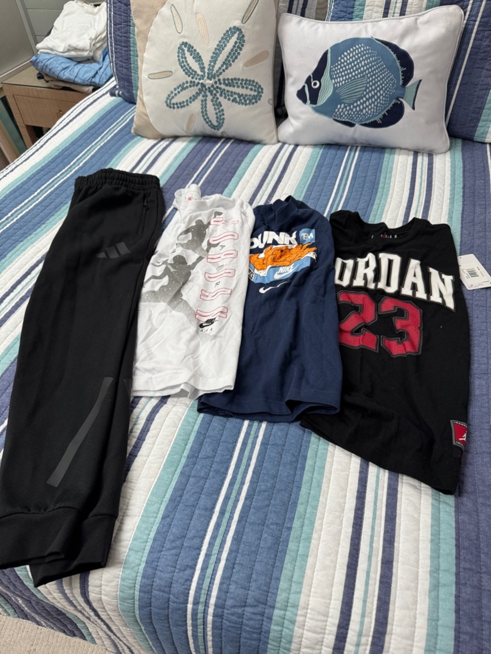 Nike Kids Black and White Athletic Pants and Graphic Tees Set